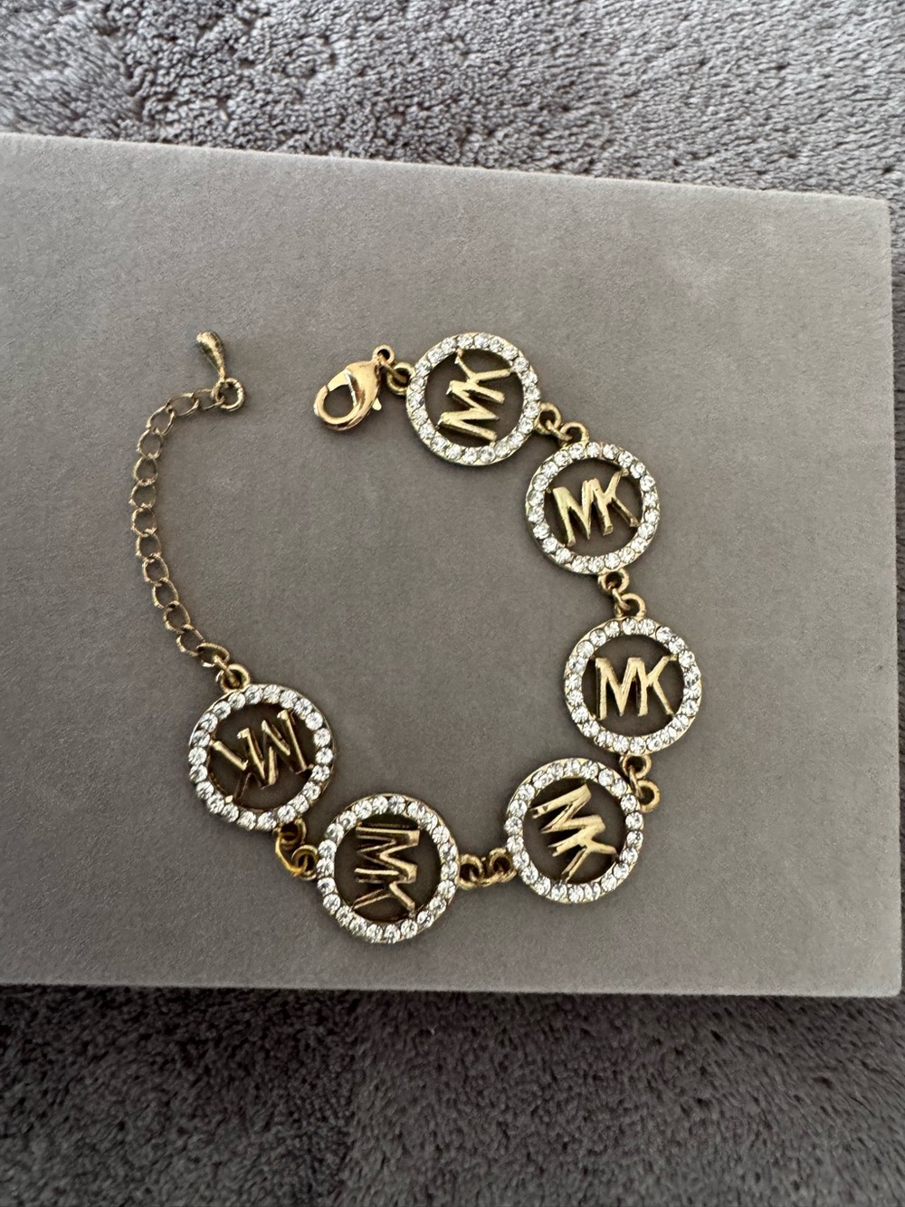 Michael Kors Gold Tone MK Logo Rhinestone Bracelet